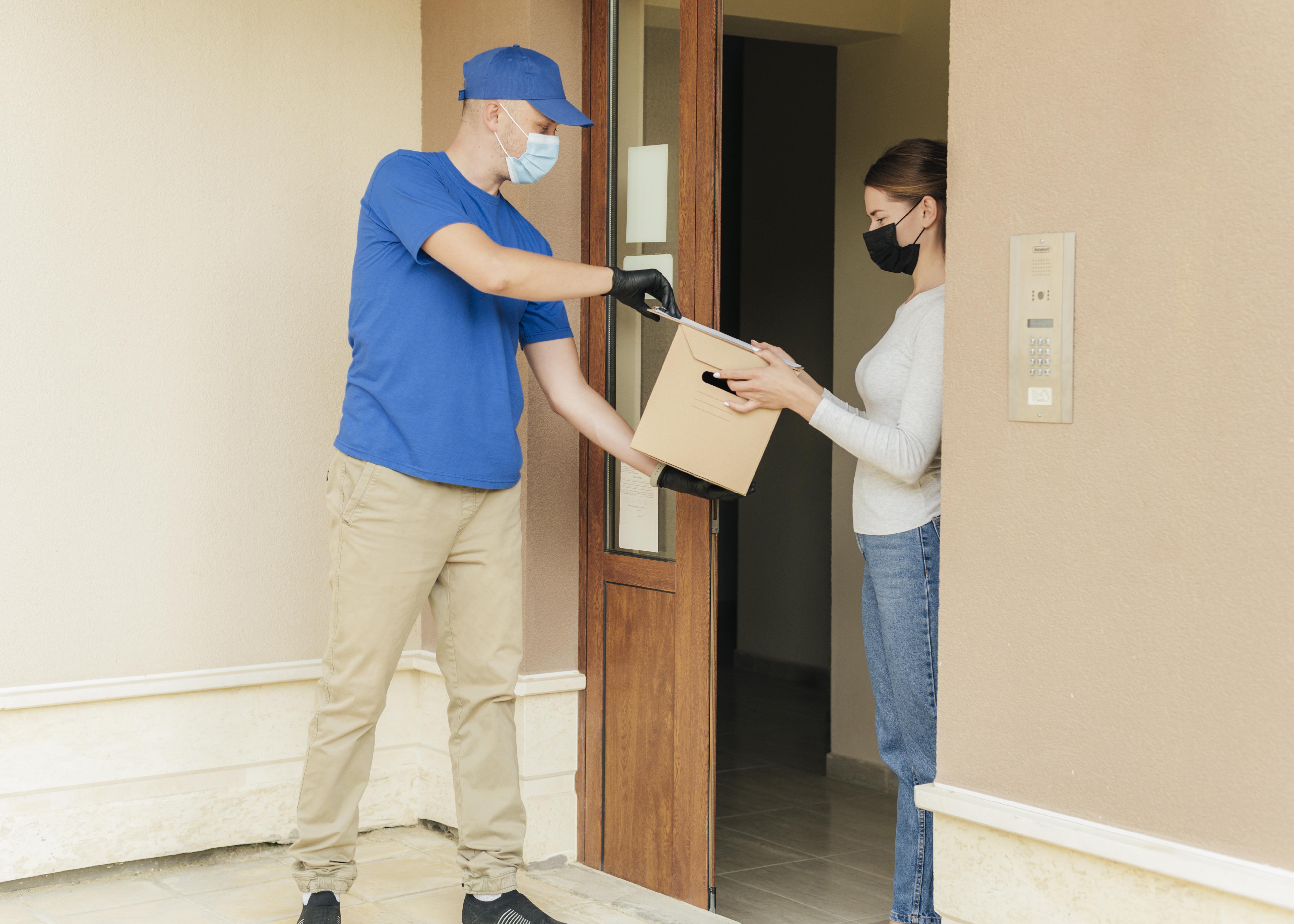 full-shot-man-delivering-box